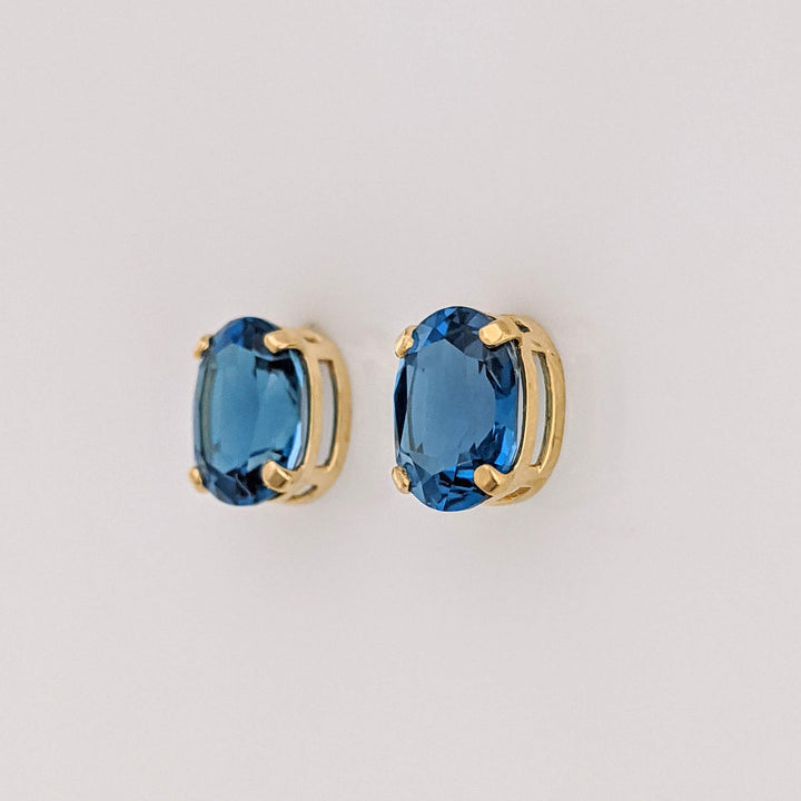 14L LONDON BLUE TOPAZ OVAL 7X9 ESTATE STUD EARRINGS 1.7 GRAMS