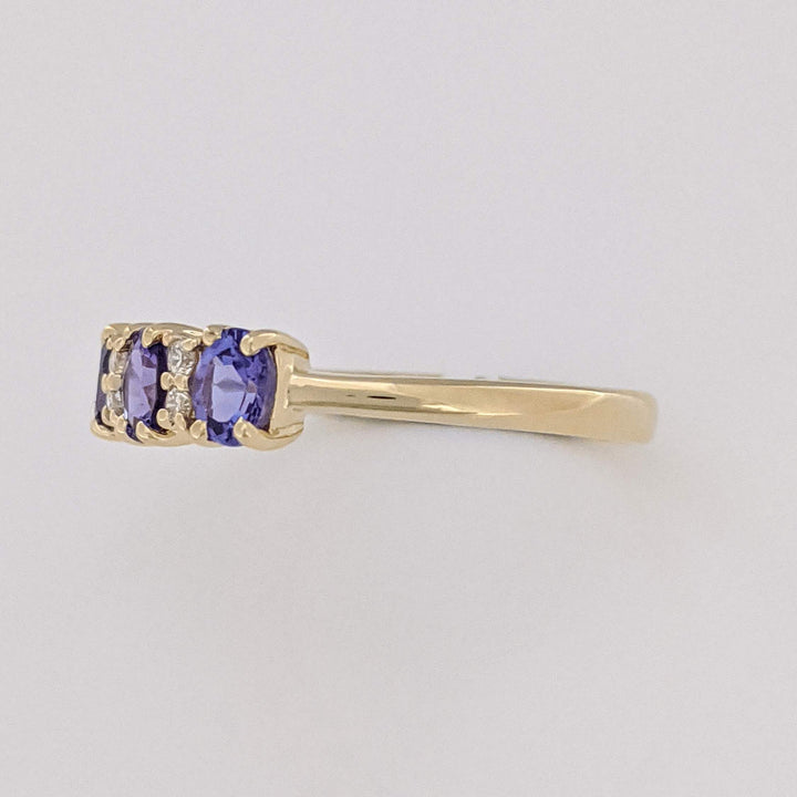 10K IOLITE OVAL 3X4 (3) WITH (4) MELEE ESTATE RING 1.3 GRAMS