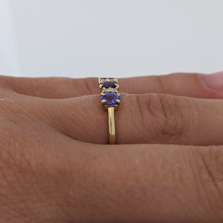 10K IOLITE OVAL 3X4 (3) WITH (4) MELEE ESTATE RING 1.3 GRAMS