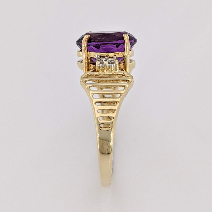 14K AMETHYST OVAL 8X10 WITH (4) MELEE OPEN LINE ESTATE RING 3.1 GRAMS