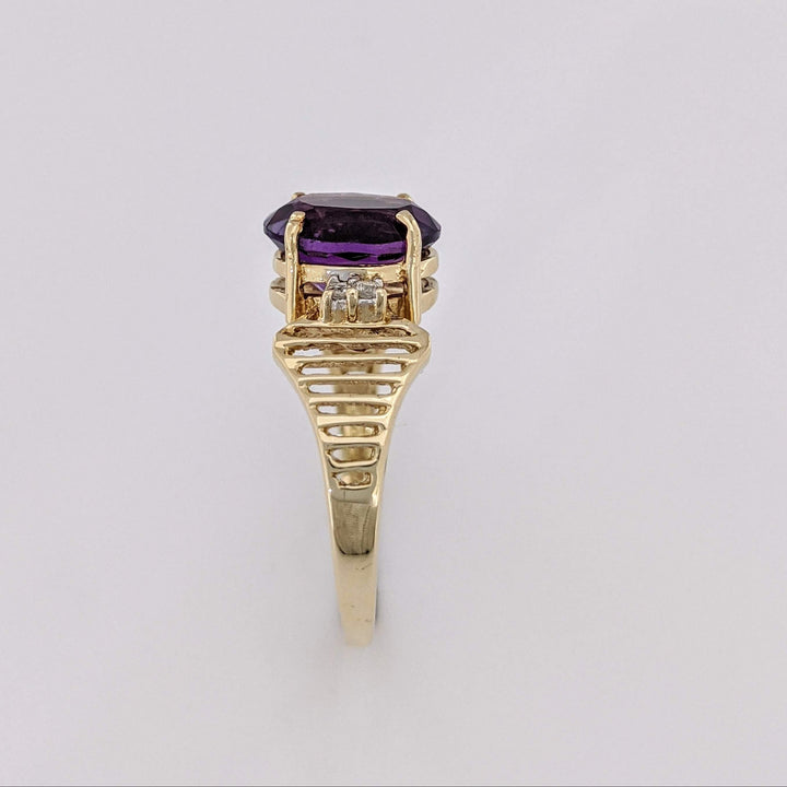 14K AMETHYST OVAL 8X10 WITH (4) MELEE OPEN LINE ESTATE RING 3.1 GRAMS
