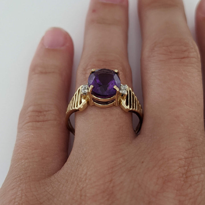 14K AMETHYST OVAL 8X10 WITH (4) MELEE OPEN LINE ESTATE RING 3.1 GRAMS