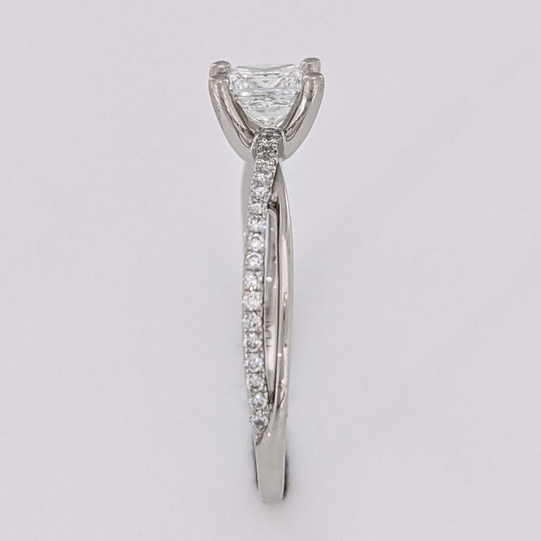 PLATINUM .68 CARAT TOTAL WEIGHT DIAMOND PRINCESS CUT (1) ROUND (36) ESTATE TWIST RING 3.1 GRAMS