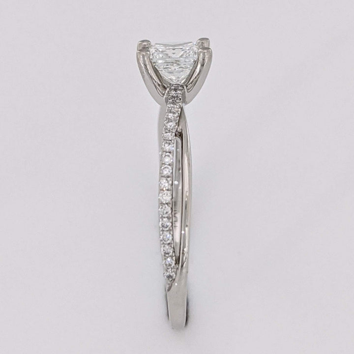 PLATINUM .68 CARAT TOTAL WEIGHT DIAMOND PRINCESS CUT (1) ROUND (36) ESTATE TWIST RING 3.1 GRAMS