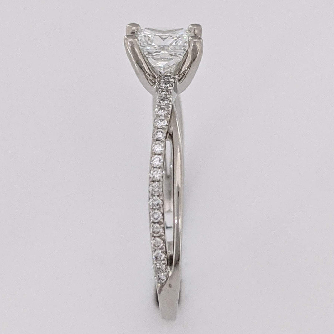 PLATINUM .68 CARAT TOTAL WEIGHT DIAMOND PRINCESS CUT (1) ROUND (36) ESTATE TWIST RING 3.1 GRAMS