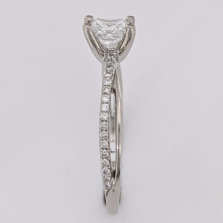 PLATINUM .68 CARAT TOTAL WEIGHT DIAMOND PRINCESS CUT (1) ROUND (36) ESTATE TWIST RING 3.1 GRAMS