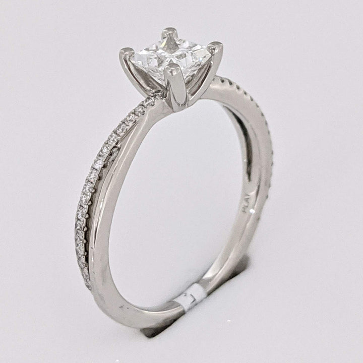 PLATINUM .68 CARAT TOTAL WEIGHT DIAMOND PRINCESS CUT (1) ROUND (36) ESTATE TWIST RING 3.1 GRAMS