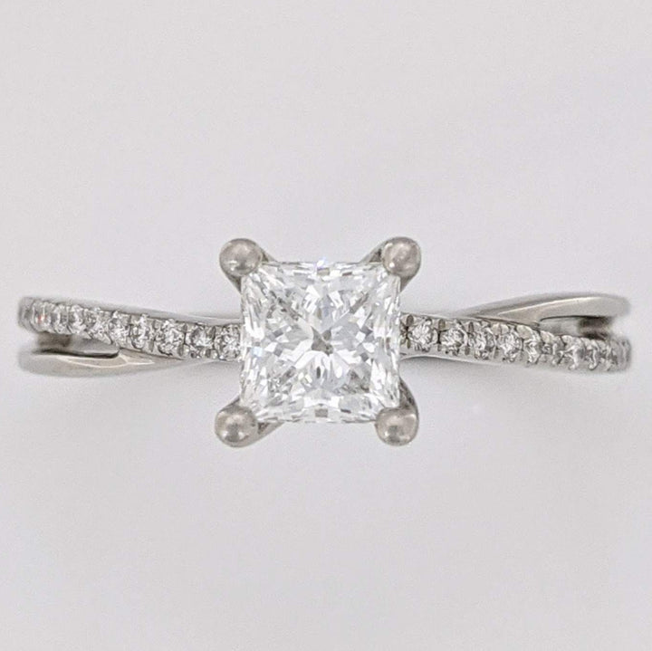 PLATINUM .68 CARAT TOTAL WEIGHT DIAMOND PRINCESS CUT (1) ROUND (36) ESTATE TWIST RING 3.1 GRAMS