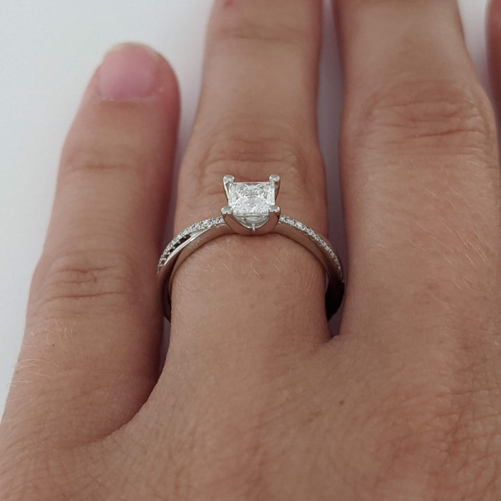 PLATINUM .68 CARAT TOTAL WEIGHT DIAMOND PRINCESS CUT (1) ROUND (36) ESTATE TWIST RING 3.1 GRAMS