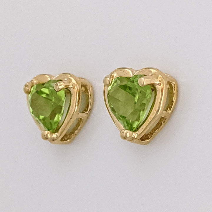 14K PERIDOT HEAERT 6MM WITH GOLD TRIM ESTATE STUD EARRINGS 1.5 GRAMS