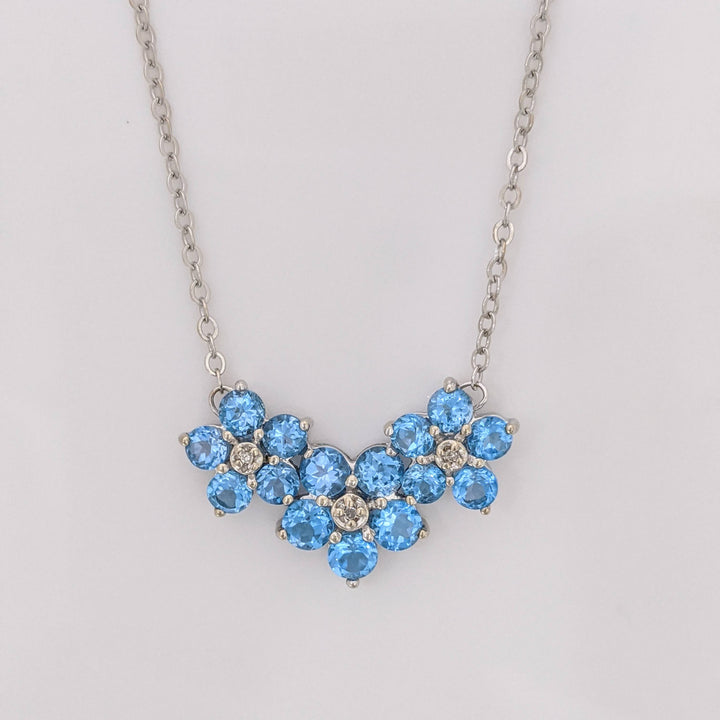10K WHITE BLUE TOPAZ ROUND (15) 3.5MM FLORAL WITH MELEE ESTATE NECKLACE 4.3 GRAMS