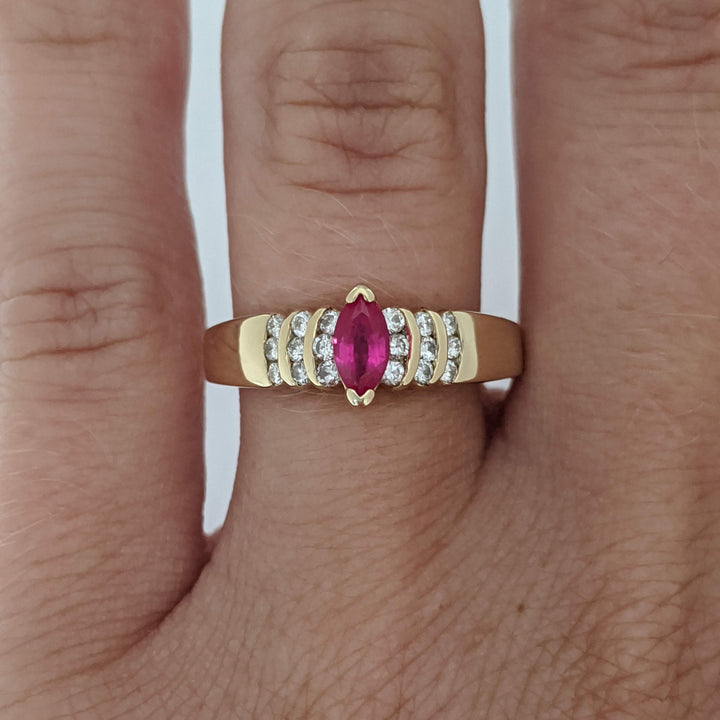 14K RUBY MARQUISE 3X6 WITH .18 DIAMOND TOTAL WEIGHT ROUND (18) ESTATE RING 2.8 GRAMS