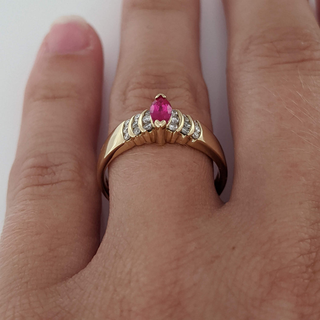 14K RUBY MARQUISE 3X6 WITH .18 DIAMOND TOTAL WEIGHT ROUND (18) ESTATE RING 2.8 GRAMS