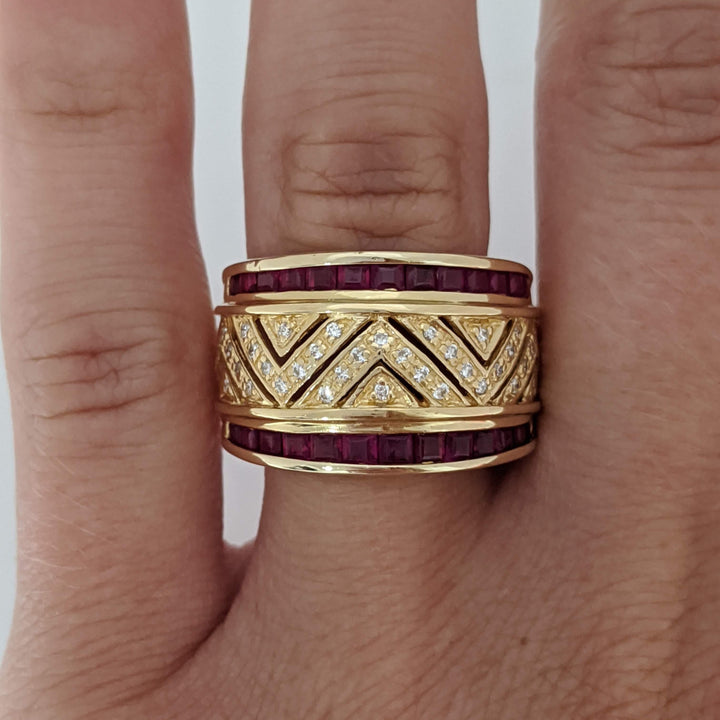 18K RUBY PRINCESS CUT (26) CHANNEL WITH .20 DIAMOND TOTAL WEIGHT (40) ESTATE BAND 9.8 GRAMS