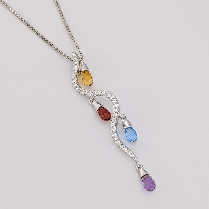 18K WHITE .33 DIAMOND TOTAL WEIGHT (31) ROUND SWIRL WITH CITRINE, GARNET, BLUE TOPAZ, AMETHYST BELL ESTATE PENDANT & CHAIN 4.7 GRAMS
