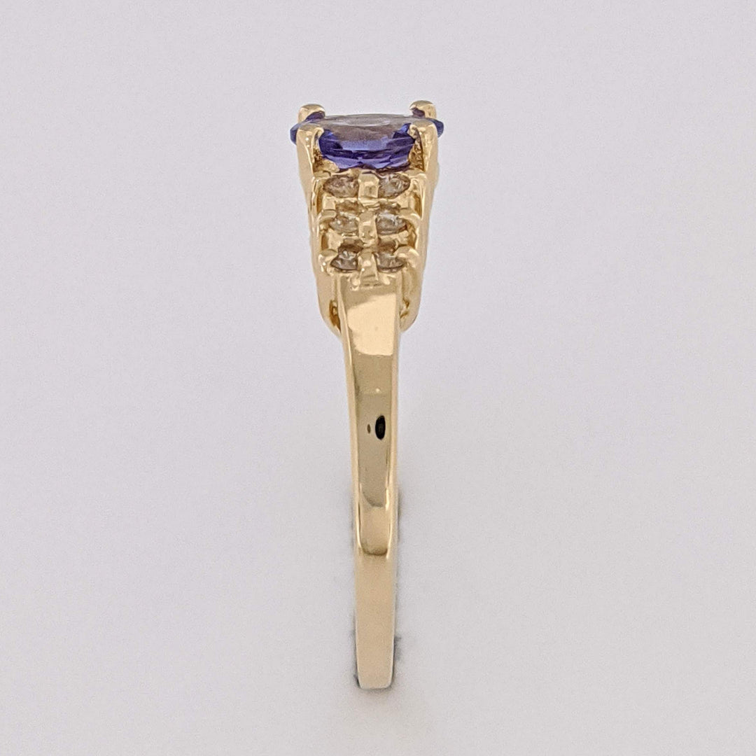 14K TANZANITE OVAL 4X6 WITH (12) MELEE ESTATE RING 2.2 GRAMS