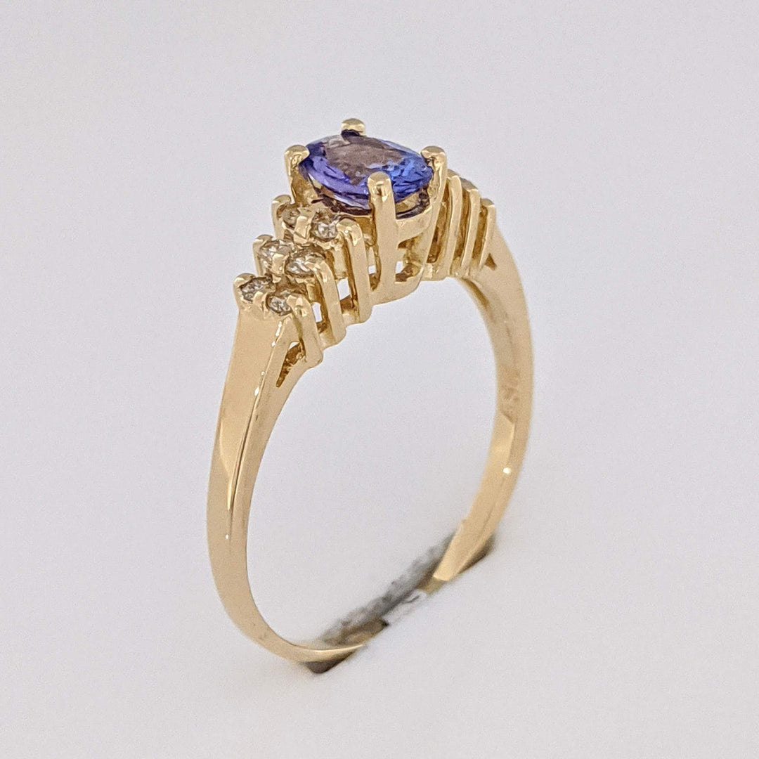 14K TANZANITE OVAL 4X6 WITH (12) MELEE ESTATE RING 2.2 GRAMS