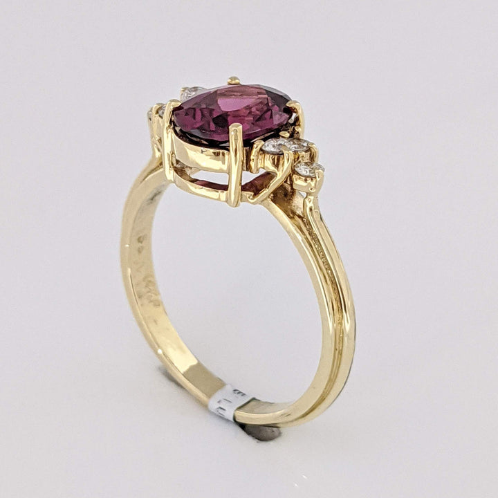 14K DEEP PINK TOURMALINE OVAL 7X9 WITH .25 DIAMOND TOTAL WEIGHT (6) ROUND ESTATE RING 4.1 GRAMS