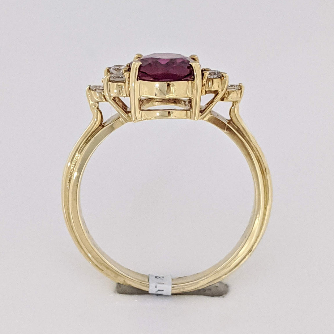 14K DEEP PINK TOURMALINE OVAL 7X9 WITH .25 DIAMOND TOTAL WEIGHT (6) ROUND ESTATE RING 4.1 GRAMS