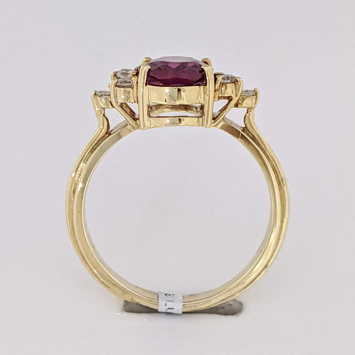 14K DEEP PINK TOURMALINE OVAL 7X9 WITH .25 DIAMOND TOTAL WEIGHT (6) ROUND ESTATE RING 4.1 GRAMS