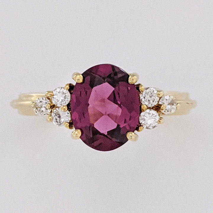 14K DEEP PINK TOURMALINE OVAL 7X9 WITH .25 DIAMOND TOTAL WEIGHT (6) ROUND ESTATE RING 4.1 GRAMS