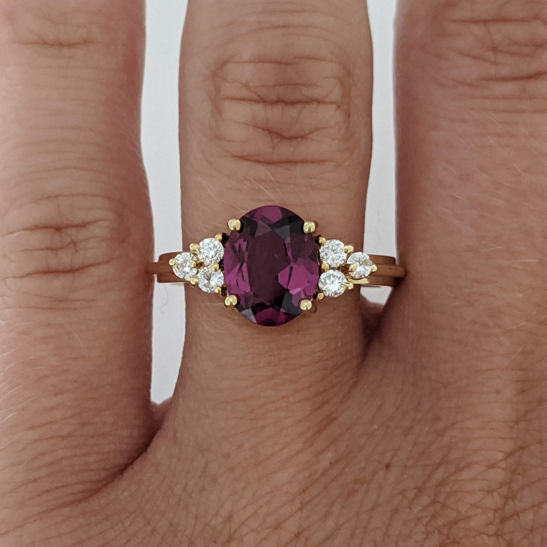 14K DEEP PINK TOURMALINE OVAL 7X9 WITH .25 DIAMOND TOTAL WEIGHT (6) ROUND ESTATE RING 4.1 GRAMS