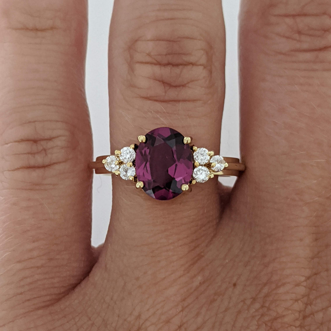 14K DEEP PINK TOURMALINE OVAL 7X9 WITH .25 DIAMOND TOTAL WEIGHT (6) ROUND ESTATE RING 4.1 GRAMS
