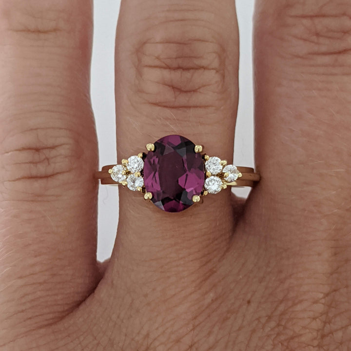 14K DEEP PINK TOURMALINE OVAL 7X9 WITH .25 DIAMOND TOTAL WEIGHT (6) ROUND ESTATE RING 4.1 GRAMS
