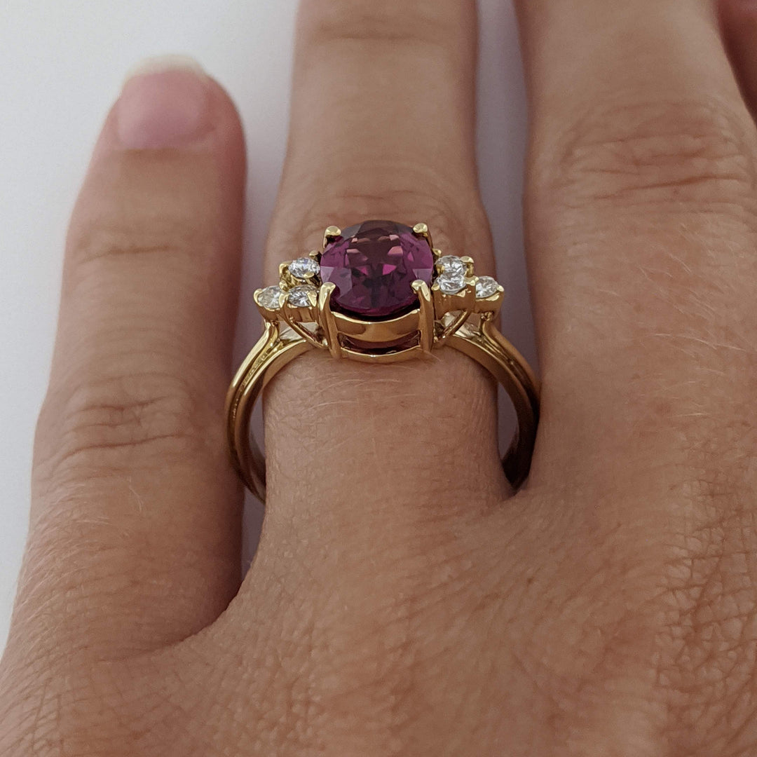 14K DEEP PINK TOURMALINE OVAL 7X9 WITH .25 DIAMOND TOTAL WEIGHT (6) ROUND ESTATE RING 4.1 GRAMS
