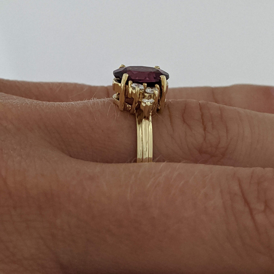 14K DEEP PINK TOURMALINE OVAL 7X9 WITH .25 DIAMOND TOTAL WEIGHT (6) ROUND ESTATE RING 4.1 GRAMS