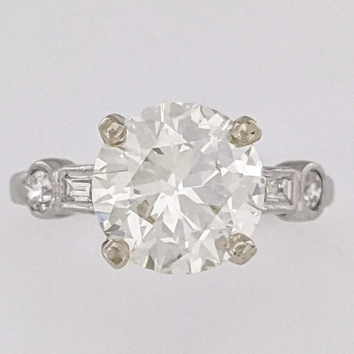 PLATINUM 2.17 CARAT TOTAL VS2 K DIAMOND ROUND WITH (2) ROUND (2) BAGUETTE ESTATE RING 3.9 GRAMS