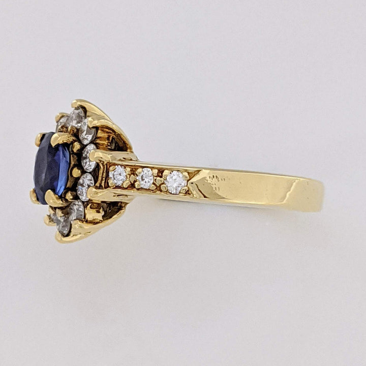 18K SAPPHIRE OVAL 4.5X5.6 "AA" WITH (16) MELEE ESTATE RING 5.2 GRAMS