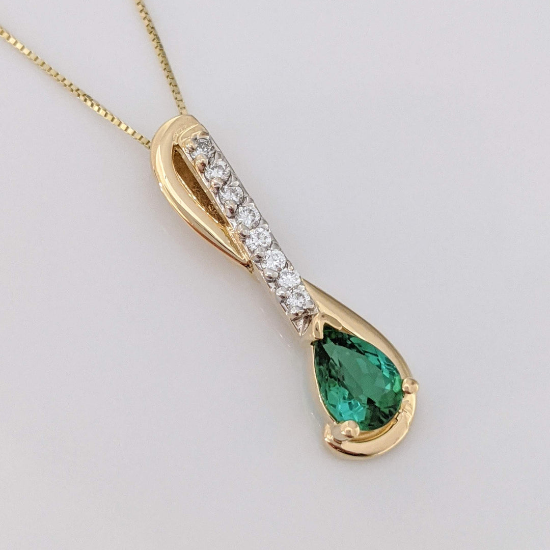 14K GREEN TOURMALINE PEAR 5X7 WITH .12 DIAMOND TOTAL WEIGHT (8) ESTATE PENDANT & CHAIN 2.9 GRAMS