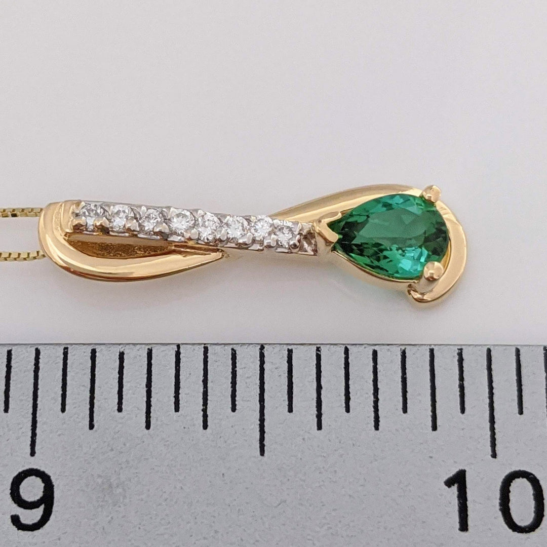 14K GREEN TOURMALINE PEAR 5X7 WITH .12 DIAMOND TOTAL WEIGHT (8) ESTATE PENDANT & CHAIN 2.9 GRAMS