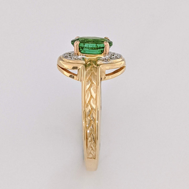 14K GREEN TOURMALINE OVAL 5X7 WITH (8) MELEE ESTATE RING 3.2 GRAMS
