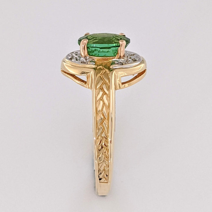 14K GREEN TOURMALINE OVAL 5X7 WITH (8) MELEE ESTATE RING 3.2 GRAMS