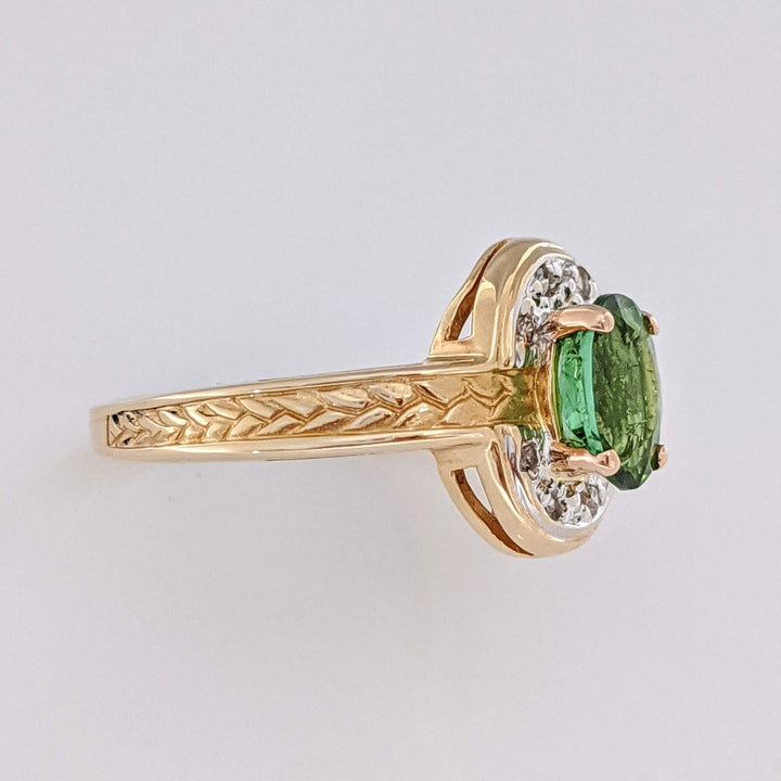 14K GREEN TOURMALINE OVAL 5X7 WITH (8) MELEE ESTATE RING 3.2 GRAMS