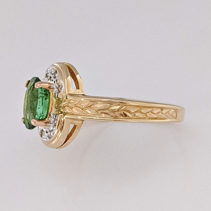 14K GREEN TOURMALINE OVAL 5X7 WITH (8) MELEE ESTATE RING 3.2 GRAMS