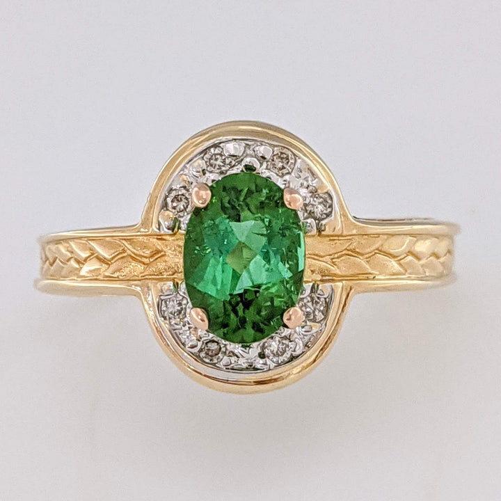 14K GREEN TOURMALINE OVAL 5X7 WITH (8) MELEE ESTATE RING 3.2 GRAMS