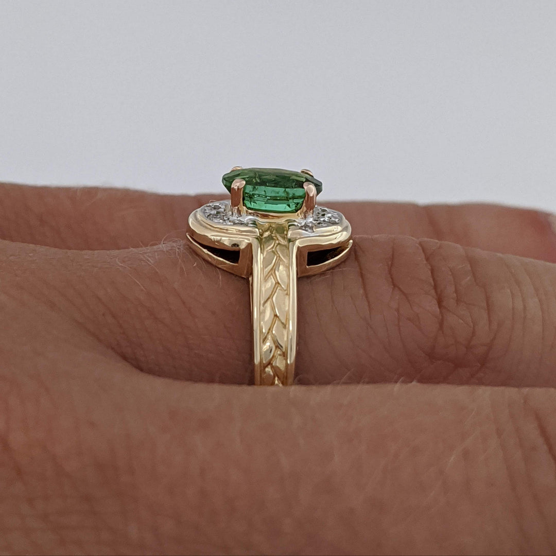 14K GREEN TOURMALINE OVAL 5X7 WITH (8) MELEE ESTATE RING 3.2 GRAMS