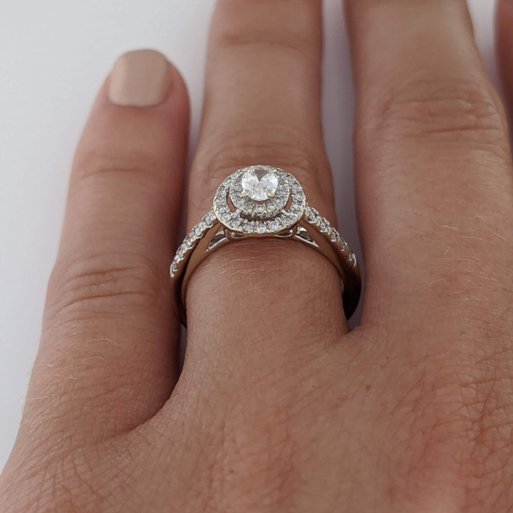 14K WHITE .60 CARAT TOTAL WEIGHT SI1 I DIAMOND OVAL (1) ROUND (46) ESTATE HALAO RING 3.2 GRAMS