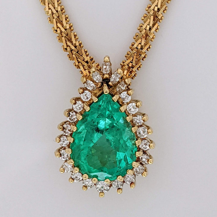 18K EMERALD PEAR 12X16 WITH .77 DIAMOND TOTAL WEIGHT (24) ROUND/ MARQUISE ESTATE NECKLACE 30.2 GRAMS