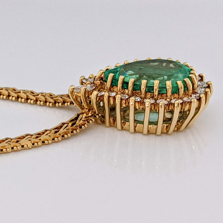 18K EMERALD PEAR 12X16 WITH .77 DIAMOND TOTAL WEIGHT (24) ROUND/ MARQUISE ESTATE NECKLACE 30.2 GRAMS