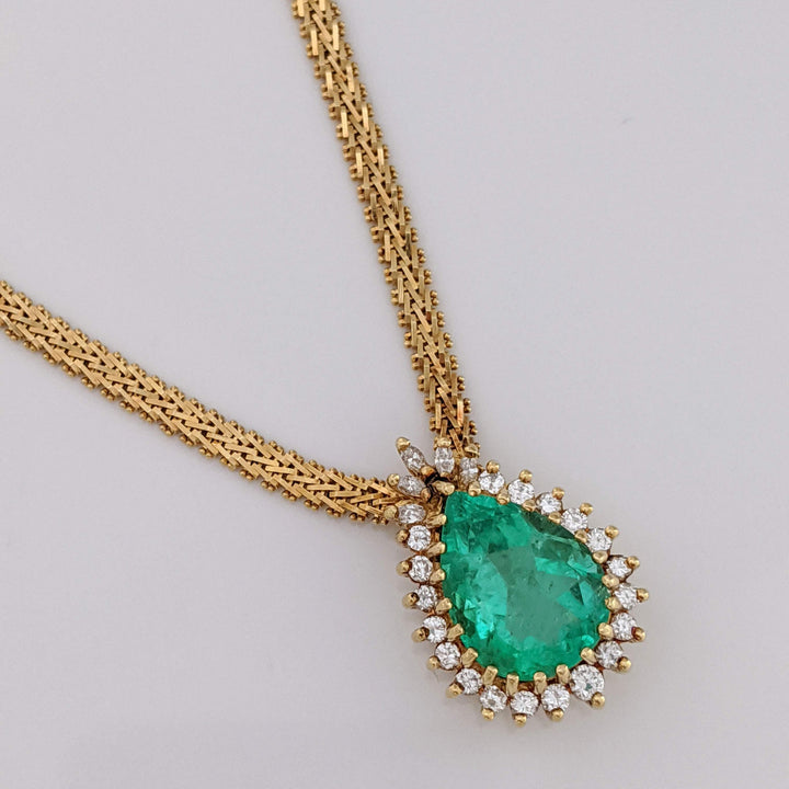 18K EMERALD PEAR 12X16 WITH .77 DIAMOND TOTAL WEIGHT (24) ROUND/ MARQUISE ESTATE NECKLACE 30.2 GRAMS