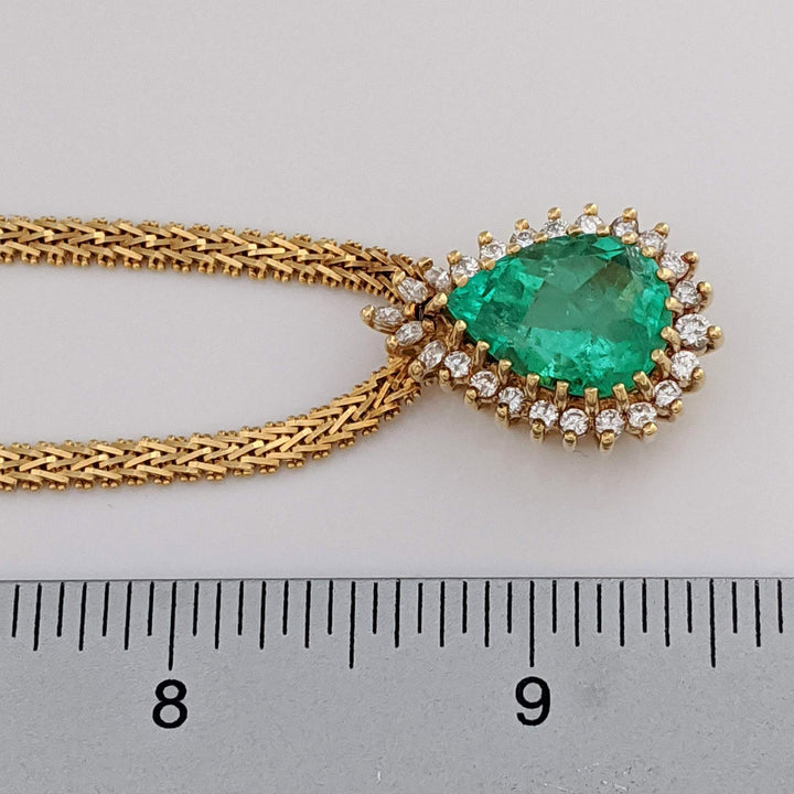 18K EMERALD PEAR 12X16 WITH .77 DIAMOND TOTAL WEIGHT (24) ROUND/ MARQUISE ESTATE NECKLACE 30.2 GRAMS