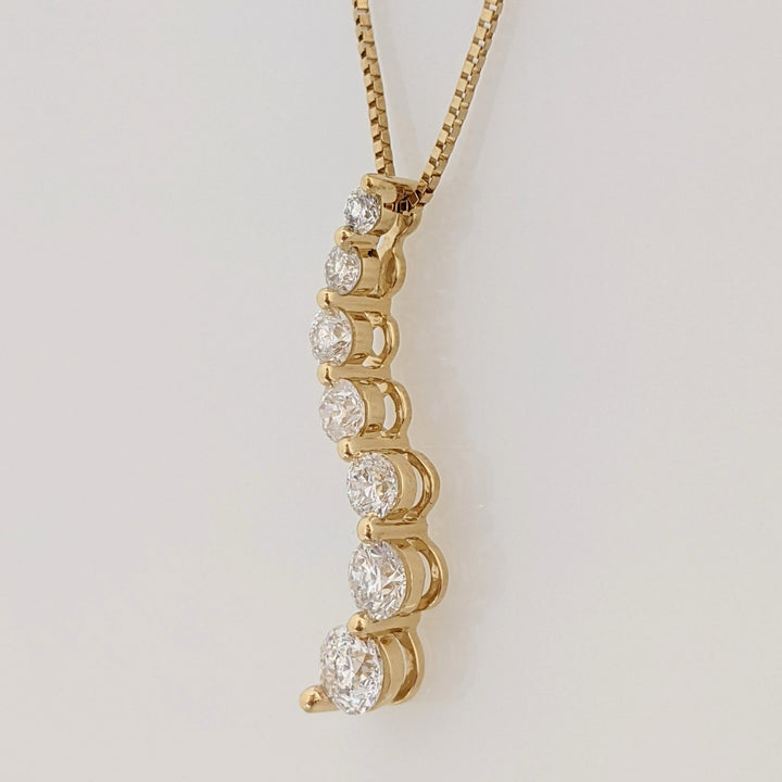 14k .80 CARAT TOTAL WEIGHT I1 G DIAMOND ROUND (7) ESTATE JOURNEY PENDANT & CHAIN 2.8 GRAMS