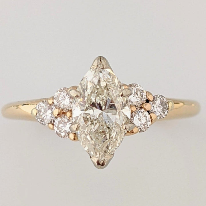 14K 1.36 CARAT TOTAL WEIGHT I1 K DIAMOND MARQUISE WITH (6) ROUND MELEE ESTATE RING 3.0 GRAMS