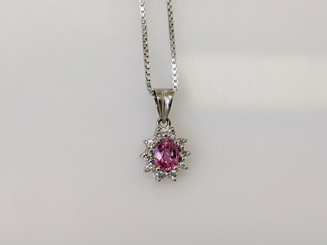 14KW PINK SAPPHIRE OVAL 4X5 WITH 10 DIAMOND HALO 3.1 GRAMS