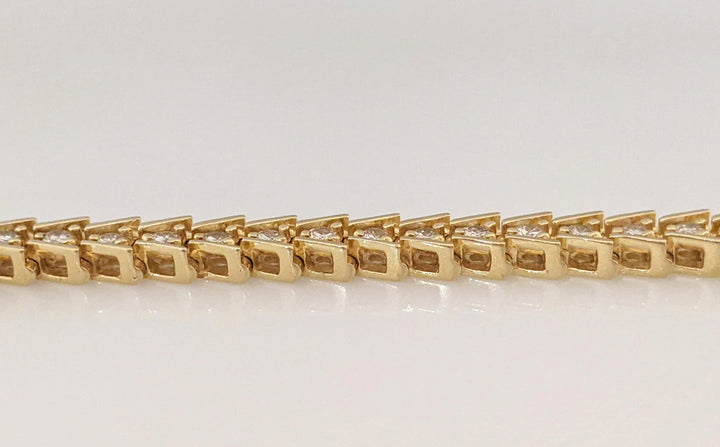 14K 3.01 CARAT TOTAL WEIGHT I1 I DIAMOND ROUND (43) BAR SET V-SHAPED ESTATE BRACELET 19.7 GRAMS