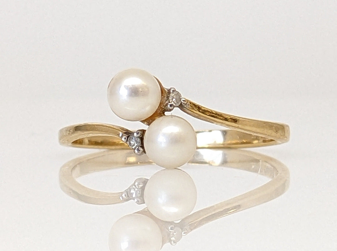 14k PEARL ROUND (2) 4MM BYPASS WITH MELEE ESTATE RING 1.4 GRAMS